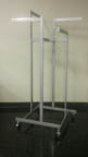 Used 4 Arm Rack on Wheels with Adjustable Arms